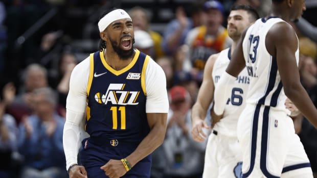 Utah Jazz guard Mike Conley (11) celebrates in the second half against the Memphis Grizzlies at Vivint Arena.